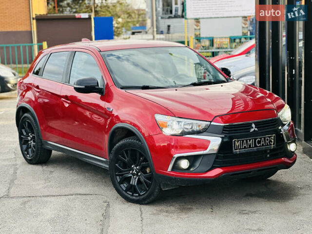 Красный Мицубиси Outlander Sport, объемом двигателя 2 л и пробегом 127 тыс. км за 12499 $, фото 6 на Automoto.ua