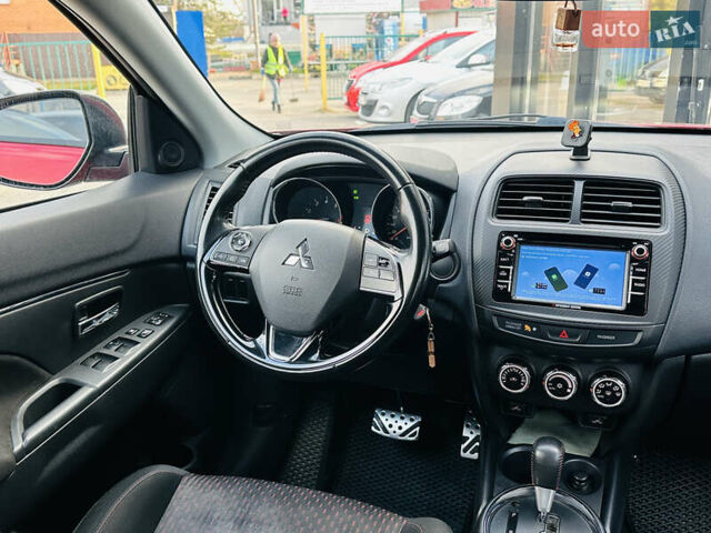 Красный Мицубиси Outlander Sport, объемом двигателя 2 л и пробегом 127 тыс. км за 12499 $, фото 24 на Automoto.ua