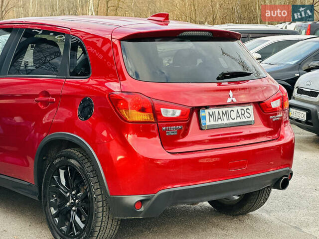 Красный Мицубиси Outlander Sport, объемом двигателя 2 л и пробегом 127 тыс. км за 12499 $, фото 10 на Automoto.ua