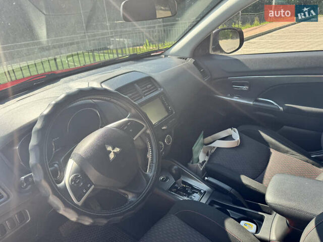 Червоний Міцубісі Outlander Sport, об'ємом двигуна 2 л та пробігом 120 тис. км за 13000 $, фото 5 на Automoto.ua