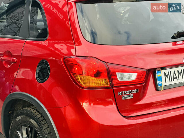 Красный Мицубиси Outlander Sport, объемом двигателя 2 л и пробегом 127 тыс. км за 12499 $, фото 11 на Automoto.ua