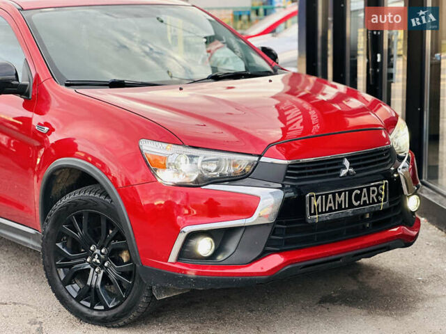 Красный Мицубиси Outlander Sport, объемом двигателя 2 л и пробегом 127 тыс. км за 12499 $, фото 7 на Automoto.ua