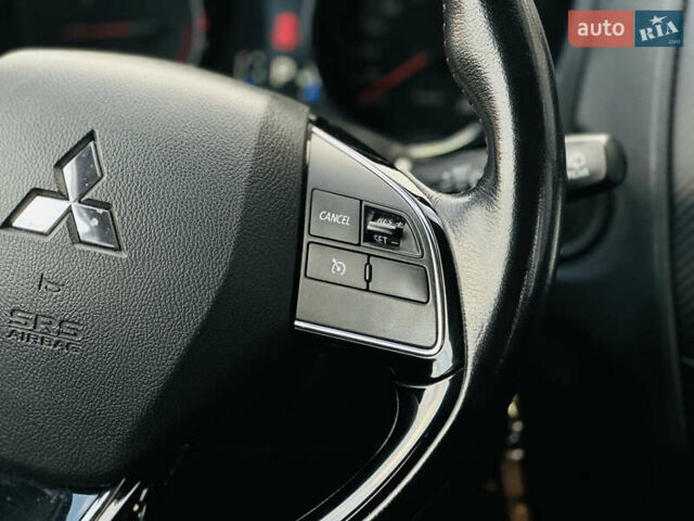 Красный Мицубиси Outlander Sport, объемом двигателя 2 л и пробегом 127 тыс. км за 12499 $, фото 28 на Automoto.ua