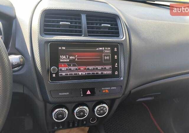 Червоний Міцубісі Outlander Sport, об'ємом двигуна 2.36 л та пробігом 185 тис. км за 13000 $, фото 7 на Automoto.ua