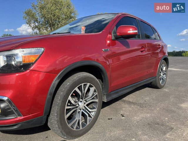 Красный Мицубиси Outlander Sport, объемом двигателя 2 л и пробегом 130 тыс. км за 14300 $, фото 10 на Automoto.ua