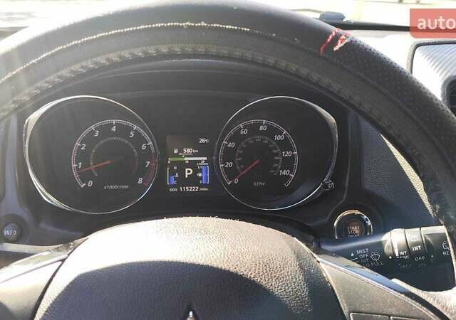 Червоний Міцубісі Outlander Sport, об'ємом двигуна 2.36 л та пробігом 185 тис. км за 13000 $, фото 9 на Automoto.ua