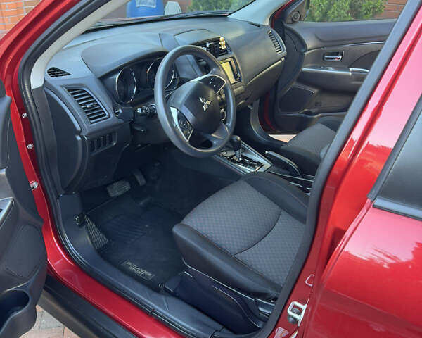 Красный Мицубиси Outlander Sport, объемом двигателя 2 л и пробегом 65 тыс. км за 12500 $, фото 4 на Automoto.ua