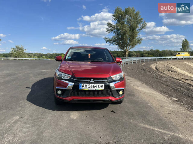 Красный Мицубиси Outlander Sport, объемом двигателя 2 л и пробегом 130 тыс. км за 14300 $, фото 1 на Automoto.ua