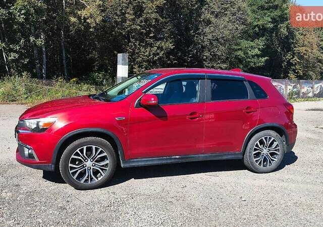 Червоний Міцубісі Outlander Sport, об'ємом двигуна 2.36 л та пробігом 185 тис. км за 13000 $, фото 2 на Automoto.ua
