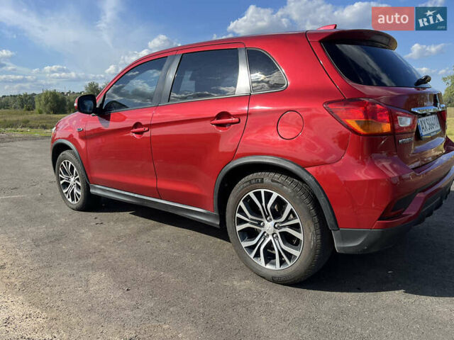 Красный Мицубиси Outlander Sport, объемом двигателя 2 л и пробегом 130 тыс. км за 14300 $, фото 9 на Automoto.ua
