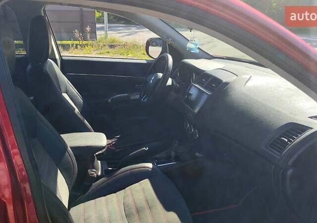 Червоний Міцубісі Outlander Sport, об'ємом двигуна 2.36 л та пробігом 185 тис. км за 13000 $, фото 12 на Automoto.ua