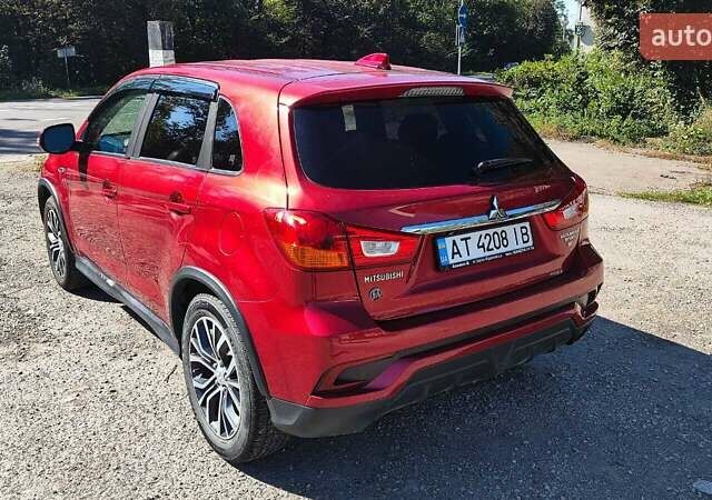 Червоний Міцубісі Outlander Sport, об'ємом двигуна 2.36 л та пробігом 185 тис. км за 13000 $, фото 3 на Automoto.ua