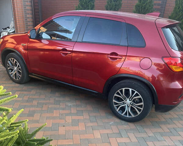 Красный Мицубиси Outlander Sport, объемом двигателя 2 л и пробегом 65 тыс. км за 12500 $, фото 2 на Automoto.ua