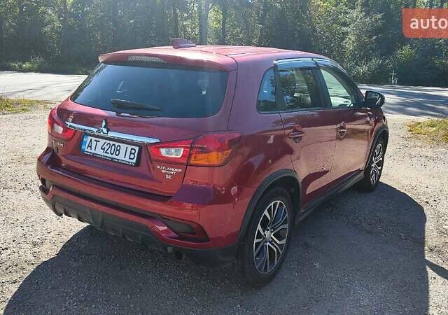 Червоний Міцубісі Outlander Sport, об'ємом двигуна 2.36 л та пробігом 185 тис. км за 13000 $, фото 4 на Automoto.ua