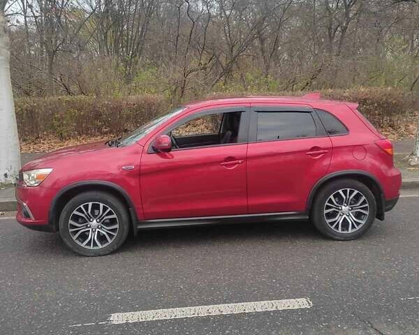 Червоний Міцубісі Outlander Sport, об'ємом двигуна 2.36 л та пробігом 152 тис. км за 13000 $, фото 4 на Automoto.ua