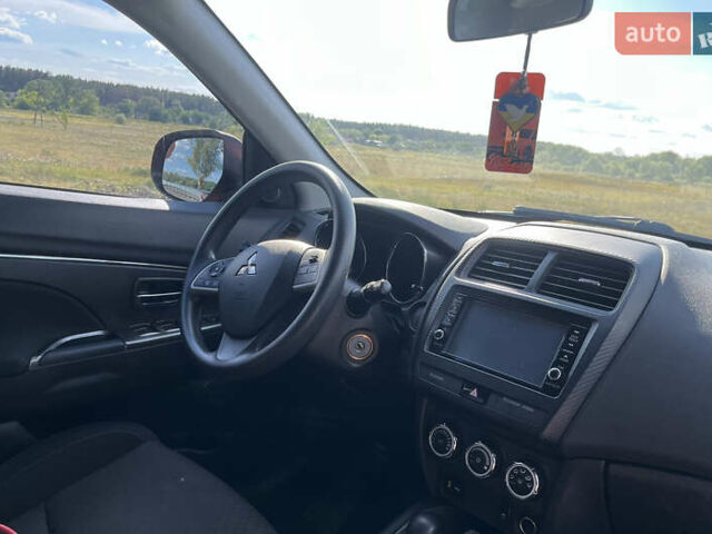 Красный Мицубиси Outlander Sport, объемом двигателя 2 л и пробегом 130 тыс. км за 14300 $, фото 3 на Automoto.ua