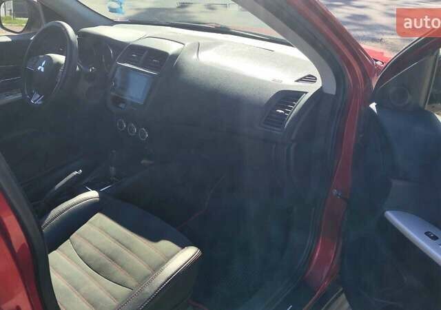 Червоний Міцубісі Outlander Sport, об'ємом двигуна 2.36 л та пробігом 185 тис. км за 13000 $, фото 17 на Automoto.ua