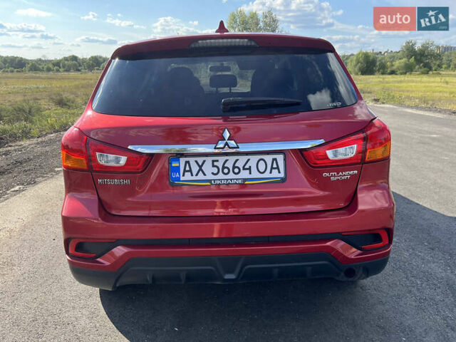 Красный Мицубиси Outlander Sport, объемом двигателя 2 л и пробегом 130 тыс. км за 14300 $, фото 7 на Automoto.ua