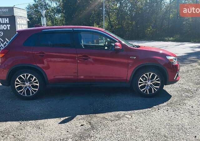 Червоний Міцубісі Outlander Sport, об'ємом двигуна 2.36 л та пробігом 185 тис. км за 13000 $, фото 5 на Automoto.ua