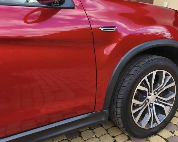 Красный Мицубиси Outlander Sport, объемом двигателя 2 л и пробегом 108 тыс. км за 14900 $, фото 29 на Automoto.ua