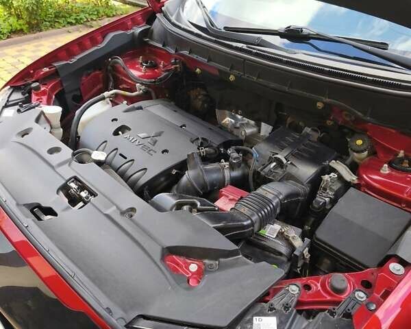 Красный Мицубиси Outlander Sport, объемом двигателя 2 л и пробегом 108 тыс. км за 14900 $, фото 28 на Automoto.ua