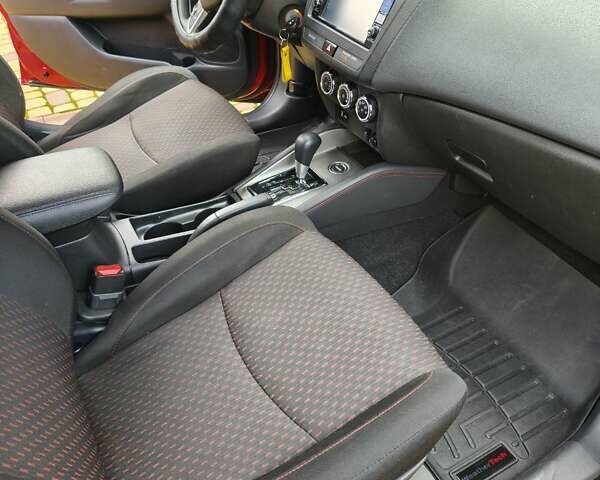 Красный Мицубиси Outlander Sport, объемом двигателя 2 л и пробегом 108 тыс. км за 14900 $, фото 6 на Automoto.ua