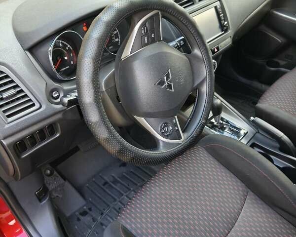 Красный Мицубиси Outlander Sport, объемом двигателя 2 л и пробегом 108 тыс. км за 14900 $, фото 19 на Automoto.ua