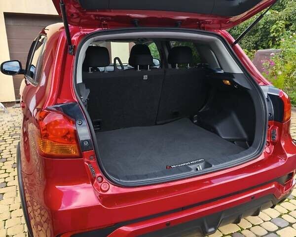 Красный Мицубиси Outlander Sport, объемом двигателя 2 л и пробегом 108 тыс. км за 14900 $, фото 15 на Automoto.ua