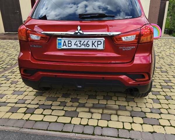 Красный Мицубиси Outlander Sport, объемом двигателя 2 л и пробегом 108 тыс. км за 14900 $, фото 8 на Automoto.ua