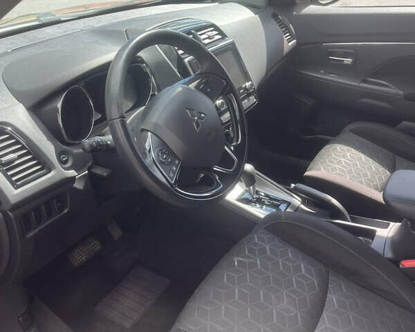 Красный Мицубиси Outlander Sport, объемом двигателя 2.4 л и пробегом 99 тыс. км за 16700 $, фото 10 на Automoto.ua