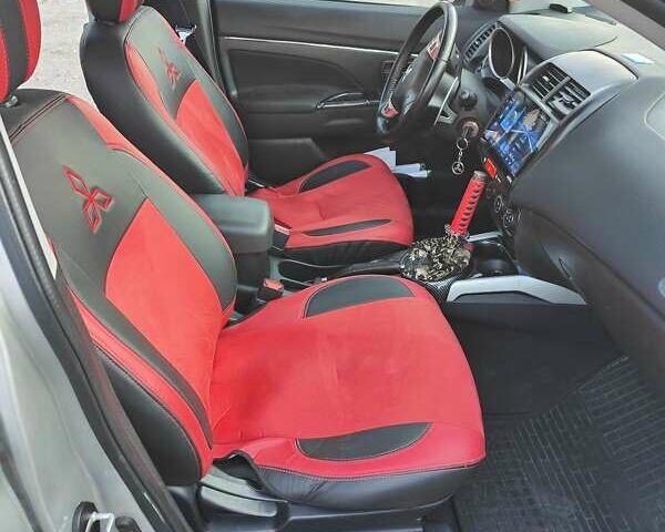 Серый Мицубиси Outlander Sport, объемом двигателя 2 л и пробегом 189 тыс. км за 11200 $, фото 12 на Automoto.ua