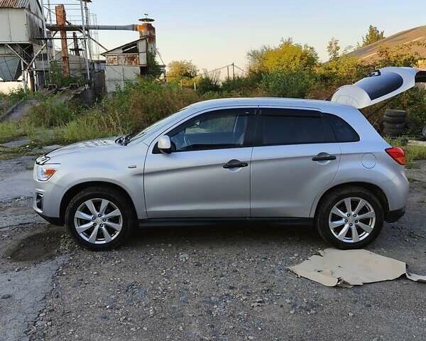 Серый Мицубиси Outlander Sport, объемом двигателя 2 л и пробегом 189 тыс. км за 11200 $, фото 11 на Automoto.ua