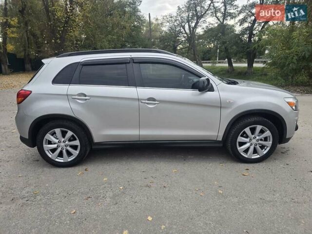Серый Мицубиси Outlander Sport, объемом двигателя 2 л и пробегом 248 тыс. км за 9999 $, фото 4 на Automoto.ua
