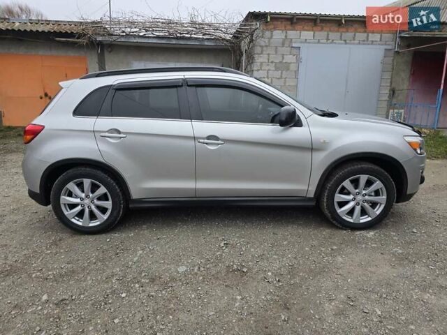 Серый Мицубиси Outlander Sport, объемом двигателя 2 л и пробегом 248 тыс. км за 9999 $, фото 5 на Automoto.ua