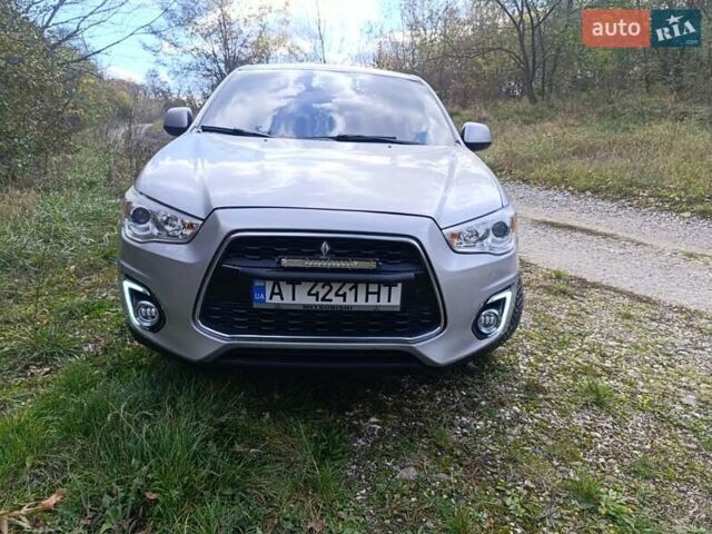 Серый Мицубиси Outlander Sport, объемом двигателя 2 л и пробегом 145 тыс. км за 11200 $, фото 6 на Automoto.ua