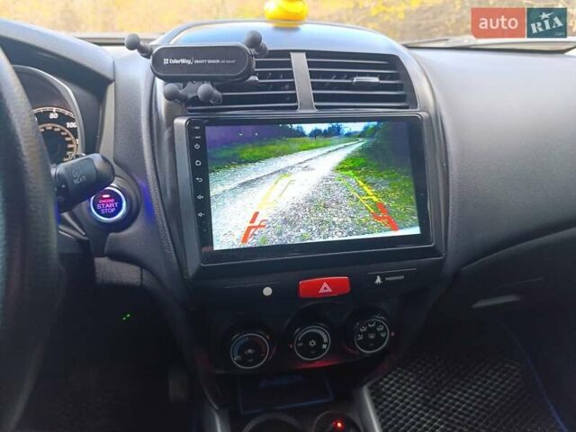 Серый Мицубиси Outlander Sport, объемом двигателя 2 л и пробегом 145 тыс. км за 11200 $, фото 12 на Automoto.ua