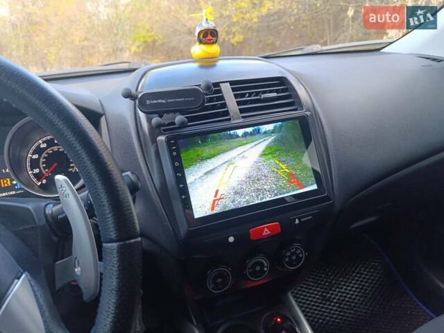 Серый Мицубиси Outlander Sport, объемом двигателя 2 л и пробегом 145 тыс. км за 11200 $, фото 8 на Automoto.ua