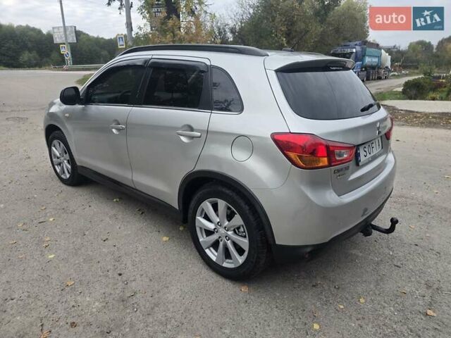 Серый Мицубиси Outlander Sport, объемом двигателя 2 л и пробегом 248 тыс. км за 9999 $, фото 3 на Automoto.ua