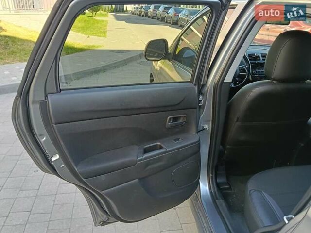 Серый Мицубиси Outlander Sport, объемом двигателя 2 л и пробегом 169 тыс. км за 8800 $, фото 7 на Automoto.ua