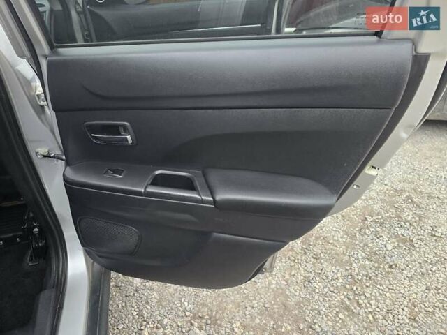 Серый Мицубиси Outlander Sport, объемом двигателя 2 л и пробегом 248 тыс. км за 9999 $, фото 11 на Automoto.ua