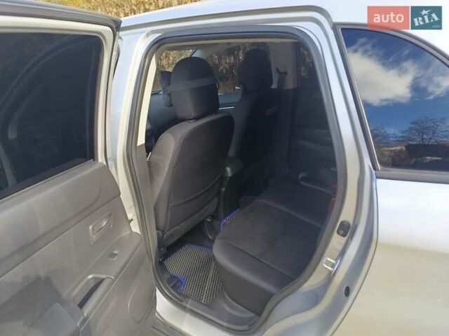 Серый Мицубиси Outlander Sport, объемом двигателя 2 л и пробегом 145 тыс. км за 11200 $, фото 3 на Automoto.ua