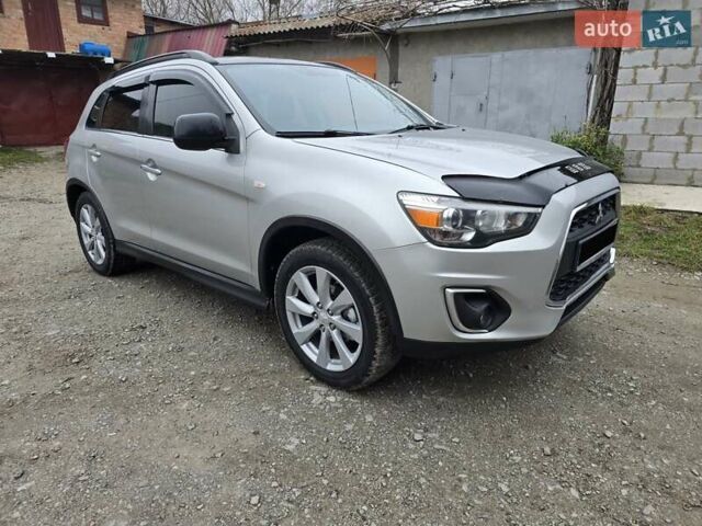 Серый Мицубиси Outlander Sport, объемом двигателя 2 л и пробегом 248 тыс. км за 9999 $, фото 4 на Automoto.ua