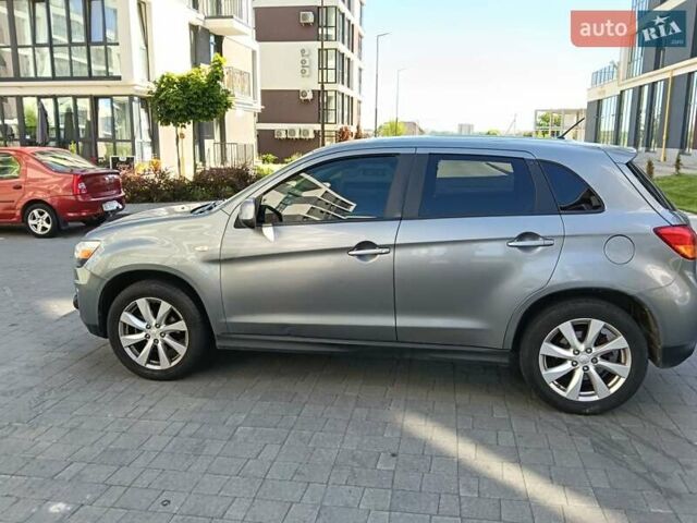 Серый Мицубиси Outlander Sport, объемом двигателя 2 л и пробегом 169 тыс. км за 8800 $, фото 4 на Automoto.ua