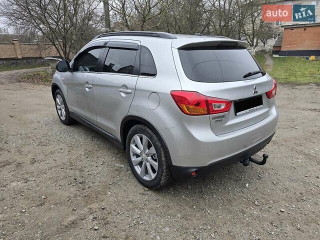 Серый Мицубиси Outlander Sport, объемом двигателя 2 л и пробегом 248 тыс. км за 9999 $, фото 7 на Automoto.ua