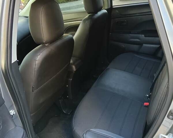Серый Мицубиси Outlander Sport, объемом двигателя 2 л и пробегом 169 тыс. км за 8800 $, фото 6 на Automoto.ua