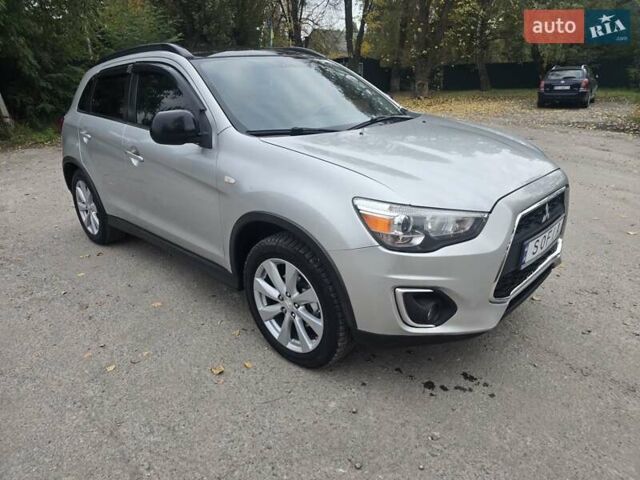 Серый Мицубиси Outlander Sport, объемом двигателя 2 л и пробегом 248 тыс. км за 9999 $, фото 6 на Automoto.ua