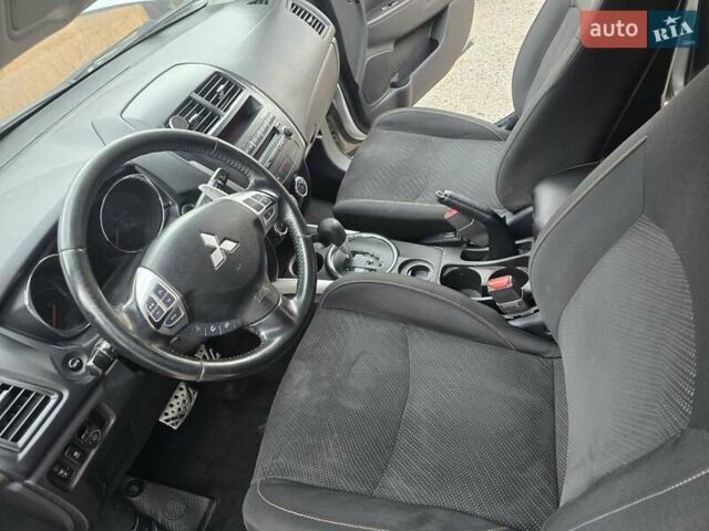 Серый Мицубиси Outlander Sport, объемом двигателя 2 л и пробегом 248 тыс. км за 9999 $, фото 13 на Automoto.ua