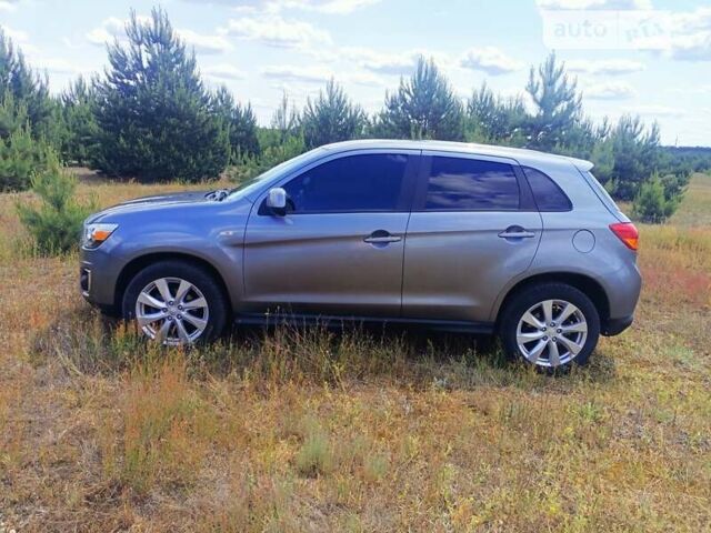 Серый Мицубиси Outlander Sport, объемом двигателя 2 л и пробегом 145 тыс. км за 11300 $, фото 8 на Automoto.ua