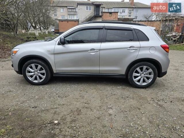 Серый Мицубиси Outlander Sport, объемом двигателя 2 л и пробегом 248 тыс. км за 9999 $, фото 6 на Automoto.ua