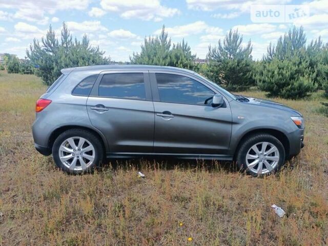 Серый Мицубиси Outlander Sport, объемом двигателя 2 л и пробегом 145 тыс. км за 11300 $, фото 1 на Automoto.ua